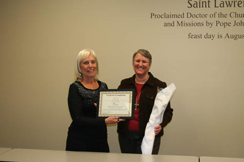 Jennie receives  certificate of completion to be the first HHH Facilitator Mentor.